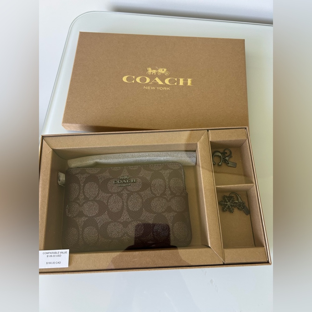 Coach brown monogram wristlet with charms gift set box